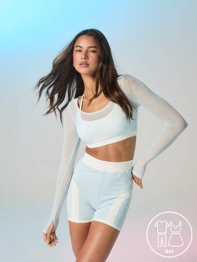 Aralina Áo croptop hai lớp dáng ngắn, dây chéo lưng, chất liệu lưới, tay dài, thích hợp cho tập gym, pilates, yoga.