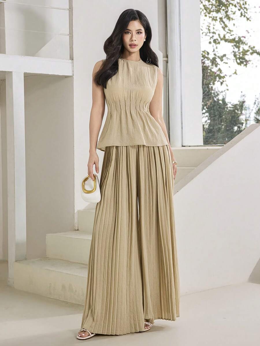 Heiryn Bộ đồ 2 món thiết kế mới gồm áo croptop không tay và quần ống rộng xếp ly, có đai thắt eo, thanh lịch và đa năng, phù hợp mặc hàng ngày và đi làm.