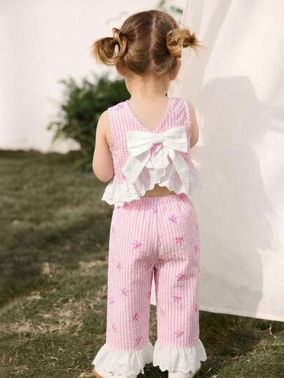 Cozy Pixies Conjunto de 2 piezas de niña bebé con top de cárdigan sin mangas con adorno floral en bloques de color y pantalones de cintura elástica