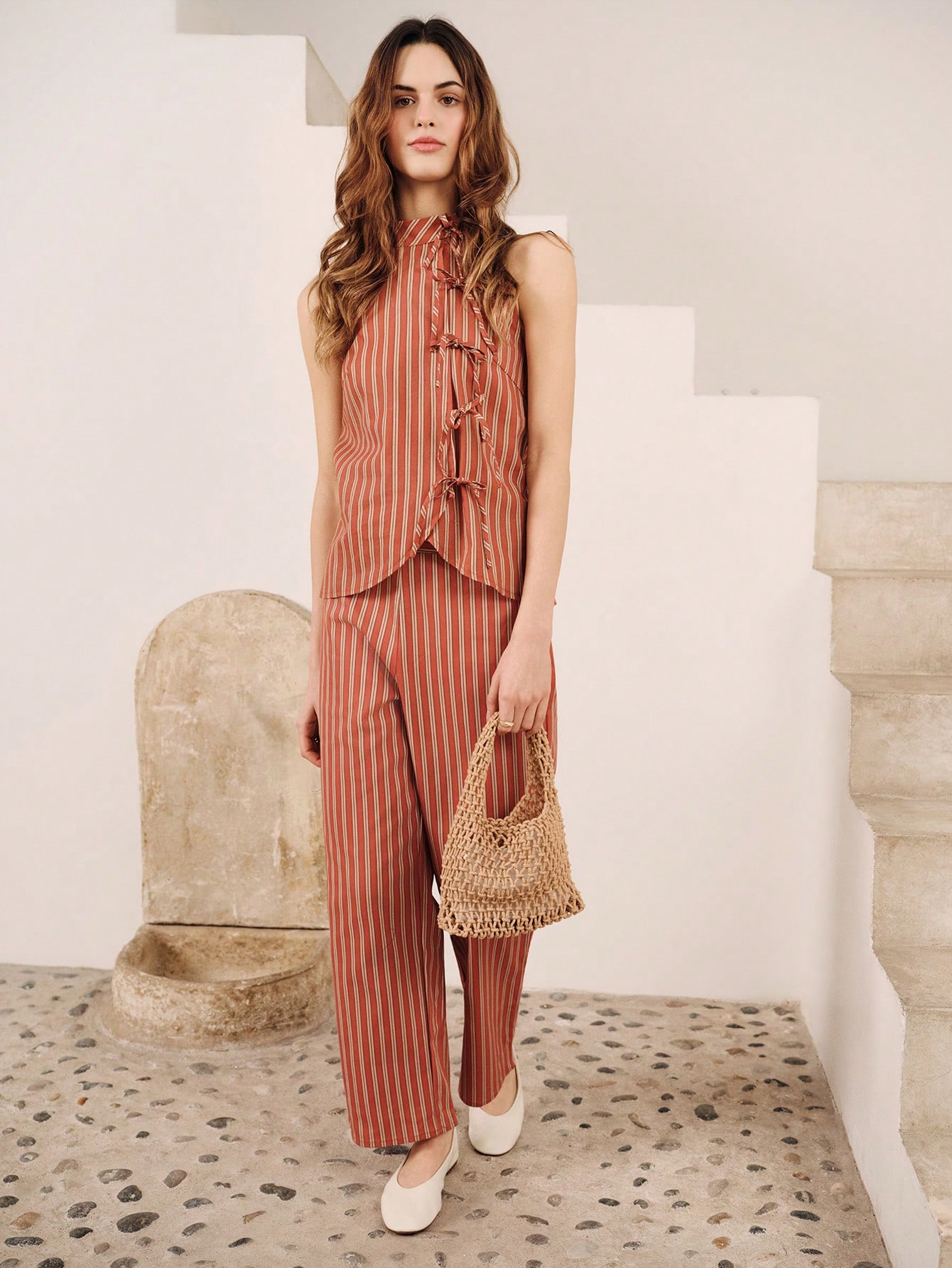 Rust Striped Sleeveless Top With Bow Detail And Straight-Leg Pants Set Chic Spring Summer Style French Style Parisian Style Vacation Business Casual Top