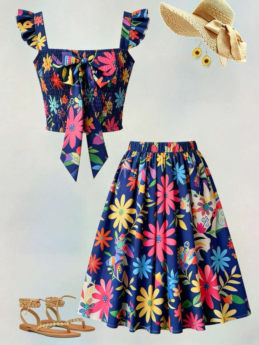 SHEIN Conjunto informal de 2 piezas para niña preadolescente con blusa de manga acampanada con lazo y falda acampanada estampada, para uso diario en vacaciones con estilo mexicano - Azul Marino - Ver 1
