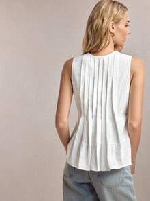 BizChic 白色圆领无袖上衣，侧边隐形拉链，蝴蝶结领口，荷叶边下摆，适合办公室、正式场合、优雅都市通勤、日常休闲，浪漫90年代复古风，百搭派对、婚礼宾客、伴娘、女主人、外出、社交活动、毕业典礼、早午餐、机场等场合。 - 白色 - 查看 4