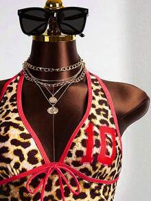 Zestiva 这款性感欧美风女式音乐节派对大胆前卫户外夏季海滩休闲度假基础百搭豹纹撞色滚边露背吊带背心搭配修身低腰泳裤的两件套泳衣，显瘦塑形，适合海滩、秋季游泳、春假、开学季、啤酒节、音乐节、假期、春季促销、海滩度假、派对、情人节、新年、学校嘉年华、母亲节、国际妇女节、家庭出游、巴西六月节、春假、毕业季等场合。 - 彩色 - 查看 5