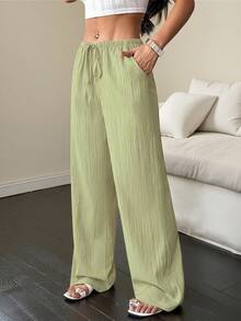 Women's Solid Color Wide-Leg Pants With Pockets And A Tie At The Waist - Limelight Green - View 7