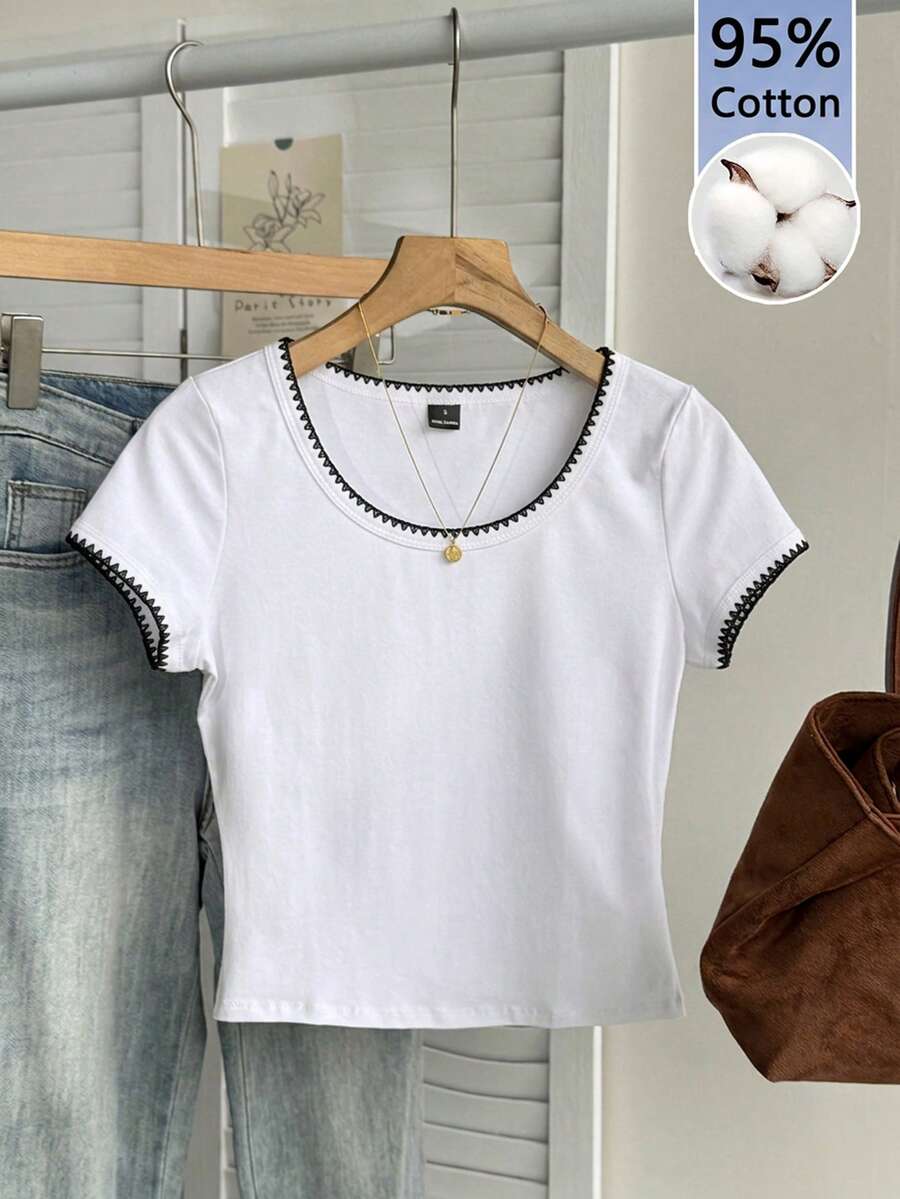 SHEIN EZwear 95%纯棉黑色荷叶边百搭简约纯色圆领短袖修身露脐T恤，女款 - 可爱柔美风，清新雅致，Y2K复古风，完美适用于西部音乐节、甜蜜约会、下午茶、春夏度假旅行、休闲居家穿着及返校季。 - 彩色 - 查看 1