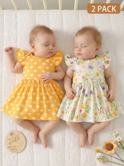 Bộ 2 váy cho bé gái sơ sinh | Họa tiết hoa nhí + trái tim vàng, chất liệu cotton, tay bồng, kiểu dáng dễ thương và ngọt ngào, phù hợp cho các dịp lễ/tiệc tùng, lý tưởng cho các buổi đi chơi và chụp ảnh.
