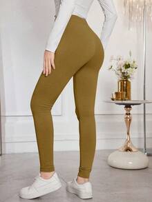 Modelyn Quần legging ôm sát, màu trơn, có dây rút, co giãn tốt. - Vàng nhạt - Xem 2