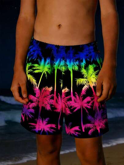SHEIN 青少年男孩彩虹色椰子树夜视荧光印花沙滩泳裤，非常适合休闲度假和泳池派对，是春夏季节的理想之选。