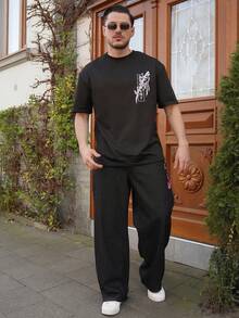 LEOGASHI LEOGASHI Áo thun nam dáng rộng thoải mái, cổ tròn, chất liệu polyester, in hình kiếm samurai và hoa anh đào, màu đen. - màu đen - Xem 7