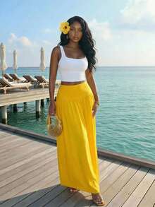 Slaydiva Conjunto feminino de duas peças para primavera/verão 2026, composto por regata cropped branca canelada com decote quadrado e saia longa amarela em formato A. Ideal para o dia a dia, férias, viagens, encontros, casamentos, como convidada de casamento, praia, estilo country, nômade, casual, aeroporto, brunch, volta às aulas e boho-chic. - Multicolorido - Ver 9
