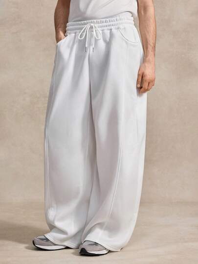 Courvante 男士休闲深灰色运动裤，标准尺码，有口袋，曲腿