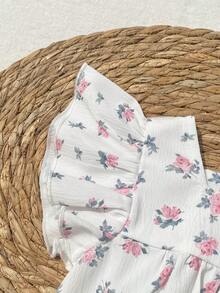 SHEIN Bộ áo liền quần họa tiết hoa nhí cho bé gái, chất liệu mềm mại và thoải mái, kiểu dáng công chúa ngọt ngào và dễ thương, thích hợp cho các hoạt động thường ngày mùa xuân/hè, du lịch, công viên, dã ngoại, chụp ảnh. - trắng - Xem 9