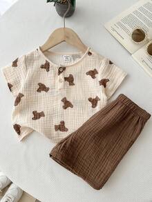 LMoss Kids Bộ 2 món cho bé trai gồm áo thun ngắn tay và quần short kaki lưng thun in hình gấu hoạt hình dễ thương, thích hợp cho mùa hè. - Nhiều màu - Xem 5