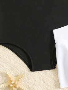 SHEIN Bộ áo tắm liền thân và váy cho bé gái, phối họa tiết nơ, thích hợp cho kỳ nghỉ biển, tiệc bể bơi, tiệc bãi biển. - Đen và trắng - Xem 4