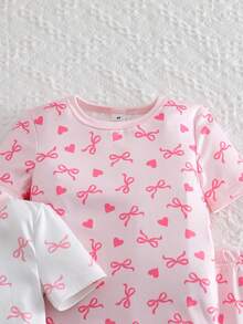 Genkimix Kids Bộ đồ ngủ ngắn tay ôm sát 6 món cho bé gái, in hình nơ và trái tim, co giãn, có thể giặt máy, thoải mái khi mặc, 3 bộ bán riêng lẻ. - Hồng - Xem 5