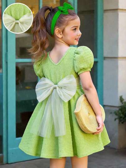 Elladie kids Đầm tay cánh hoa màu xanh lá cây dành cho bé gái, chất liệu vải có họa tiết, điểm nhấn là nơ phía sau, thắt eo, dễ thương và đa năng, phù hợp cho các dịp thường nhật, nghỉ lễ, chất liệu thoải mái và rộng rãi, mẫu mới mùa hè 2026 dành cho bé gái.