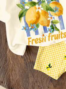 SHEIN Sweet Retro Cream Lemon Tree Print Pattern, Fresh Yellow Plaid Print Pattern, Resort Countryside Style, Baby Girl Casual Loose Round Neck Short Sleeve T-Shirt And Skinny Bike Shorts Set, Suitable For Spring/Summer, Cute Summer Outfits For Summer Kids Items, Summer Outing Items, Korean Style, Easy Comfort, Stylish Kids, Y2K, Kawaii, Party, Everyday, Vacation, Cute, Comfy, Summer 2026, Cottagecore, Weekend Casual, Family Outing, Photoshoot Outfits, Chill Chill, Baby & Kids Graphic Tops - Multicolor - View 6