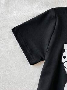 SHEIN Vintaside Kids 两件套可爱女童休闲短袖上衣和长裤套装，饰有心形蝴蝶结印花，可爱时尚，适合春夏户外活动、度假、日常穿着和旅行。 - 黑色 - 查看 7