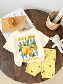 SHEIN Sweet Retro Cream Lemon Tree Print Pattern, Fresh Yellow Plaid Print Pattern, Resort Countryside Style, Baby Girl Casual Loose Round Neck Short Sleeve T-Shirt And Skinny Bike Shorts Set, Suitable For Spring/Summer, Cute Summer Outfits For Summer Kids Items, Summer Outing Items, Korean Style, Easy Comfort, Stylish Kids, Y2K, Kawaii, Party, Everyday, Vacation, Cute, Comfy, Summer 2026, Cottagecore, Weekend Casual, Family Outing, Photoshoot Outfits, Chill Chill, Baby & Kids Graphic Tops - Multicolor - View 2