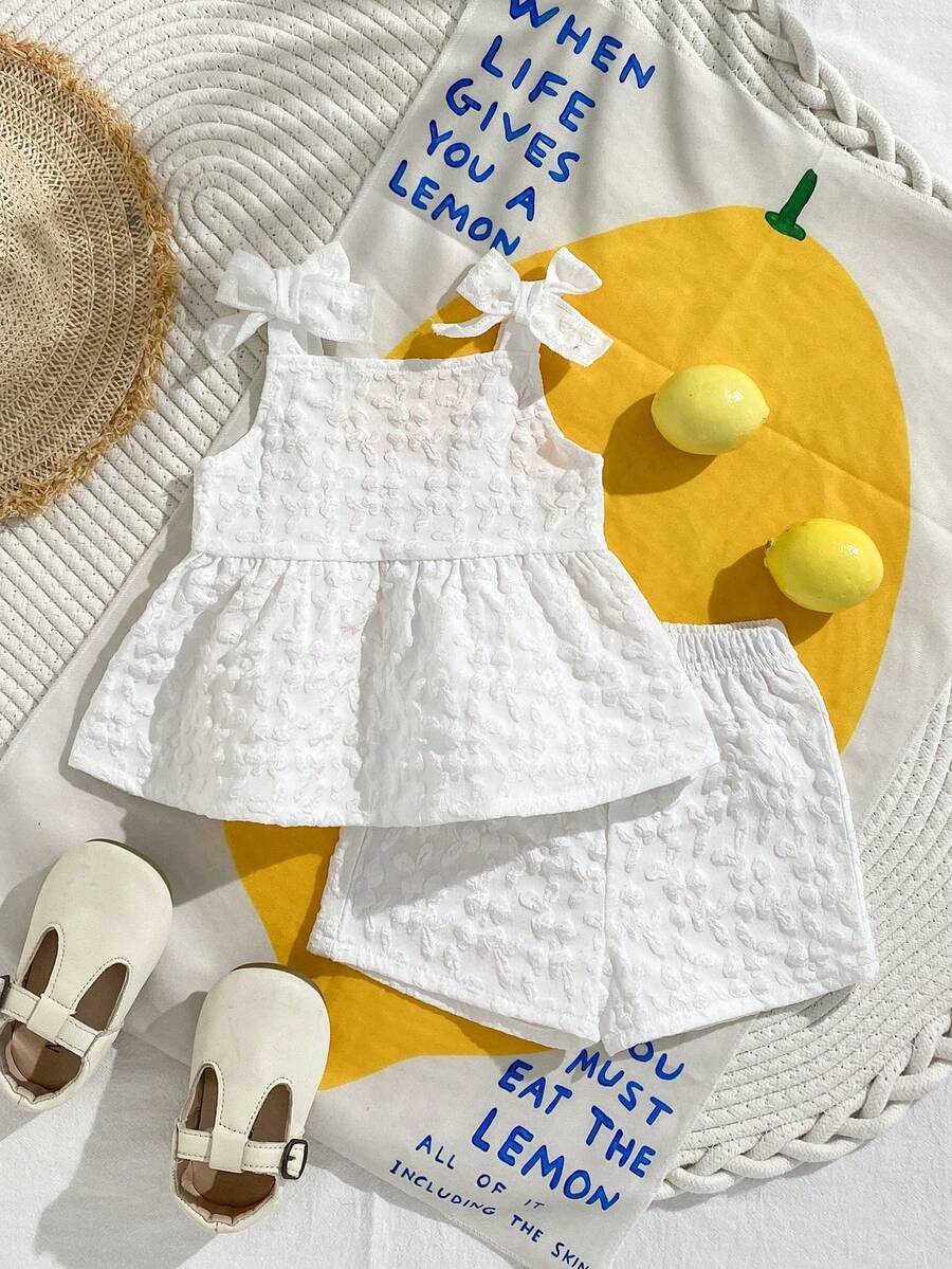 SHEIN Playful Pals 2件套女婴幼儿/新生儿0-3岁休闲日常可爱度假条纹蝴蝶结装饰吊带背心+短裤套装,春夏款 - 白色 - 查看 1