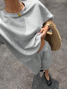 Muchica Conjunto casual de 2 piezas de top de manga corta de cuello redondo y pantalones cortos de unicolor para mujer - Gris Claro - Ver 10