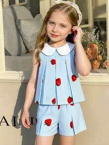 SHEIN Elladie kids Bộ 2 món cho bé gái (size nhỏ) gồm áo thun và quần short xếp ly, chất liệu vải dệt kim, họa tiết dâu tây đỏ dễ thương, sọc xanh trắng, không tay. Phù hợp với phong cách Hàn Quốc dễ thương, thoải mái cho mặc hàng ngày, đi học, đi chơi, đi biển, dự tiệc, mùa xuân/hè. - Màu xanh lam - Xem 4