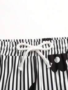 SHEIN Ensemble t-shirt à manches courtes col rond et pantalon ample avec imprimé floral rayé, tenue décontractée d'été pour préadolescentes en vacances - Noir et Blanc - Voir 4