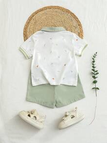 SHEIN 这款幼儿男童夏季休闲两件套，包含一件棕榈树和小船印花翻领Polo衫和一条松紧腰短裤，时尚舒适，适合6个月至3岁的男童，是日常穿着、户外活动和返校的理想之选。 - 綠色 - 查看 2