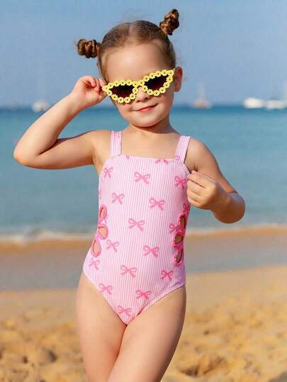 Traje de baño de una pieza con tirantes de espagueti, estampado de rayas y lazo hueco en la cintura para niña joven