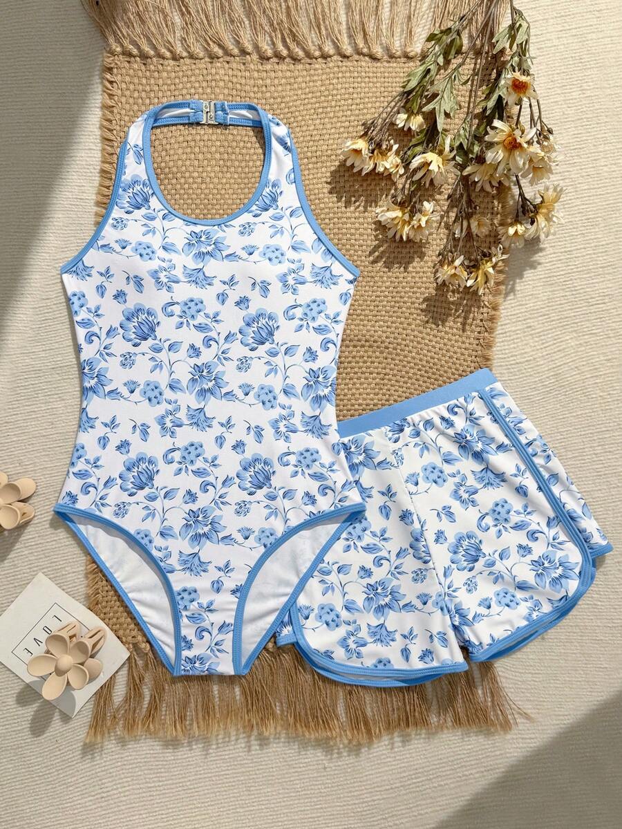 SHEIN 少女碎花连体泳衣,可调节挂脖领口和松紧腰短裤,可爱法式风格,适合游泳、泳池、冲浪、度假、假日、新年、春假、海滩等场合。 - 藍色 - 查看 1