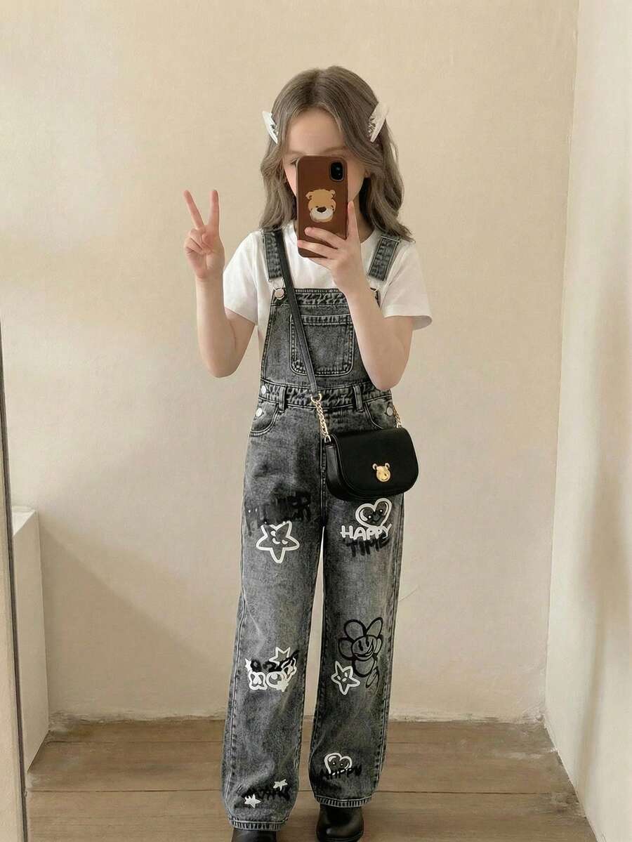 SHEIN Quần yếm denim dáng rộng màu xám in họa tiết hoa và mặt cười dành cho bé gái. - Xám - Xem 1