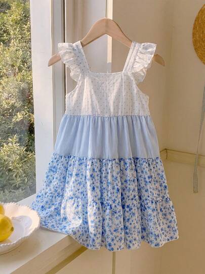 SHEIN Vestido largo de halter de estilo jardín de viento de polvo azul medio para niña joven, de tela tejida, tipo A-line. Con su suave tono de polvo azul medio y un diseño de halter delicado, la falda está cubierta con pequeños patrones de flores blancas, como flores floreciendo en primavera. El borde con volantes del tirante es ingenioso y lindo, agregando dulzura y capas al conjunto. Adecuado para playa de vacaciones, salidas, ocio en casa, bodas, cumpleaños, actuaciones de fiestas y otras ocasiones