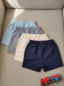 SHEIN Playful Pals 幼儿男童休闲弹力腰短裤，带口袋、假门襟和抽绳装饰，百搭风格，适合日常穿着、上学、旅行和运动。 - 彩色 - 查看 2