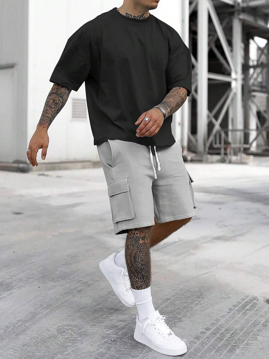 Manfinity Homme Bộ đồ nam đơn sắc tối giản gồm áo thun ngắn tay và quần short, gồm 2 món, thích hợp mặc hàng ngày. - Nhiều màu - Xem 1