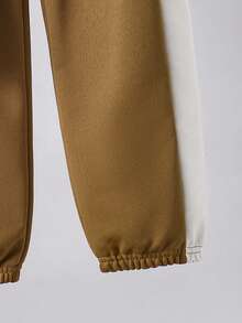 SHEIN Streecool Kids 男童休闲Polo衫套装（2件套），上衣采用撞色拼接设计，并饰有织唛，裤子采用撞色锥形裤腿设计，面料舒适，适合夏秋穿着。 - 棕色 - 查看 3