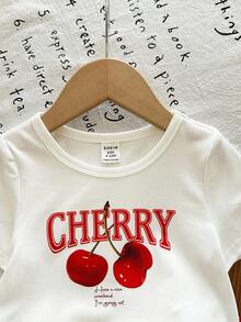 LMoss Kids Bộ 2 món cho bé gái gồm áo thun dệt kim họa tiết quả anh đào và quần short dệt kẻ caro. - Nhiều màu - Xem 6