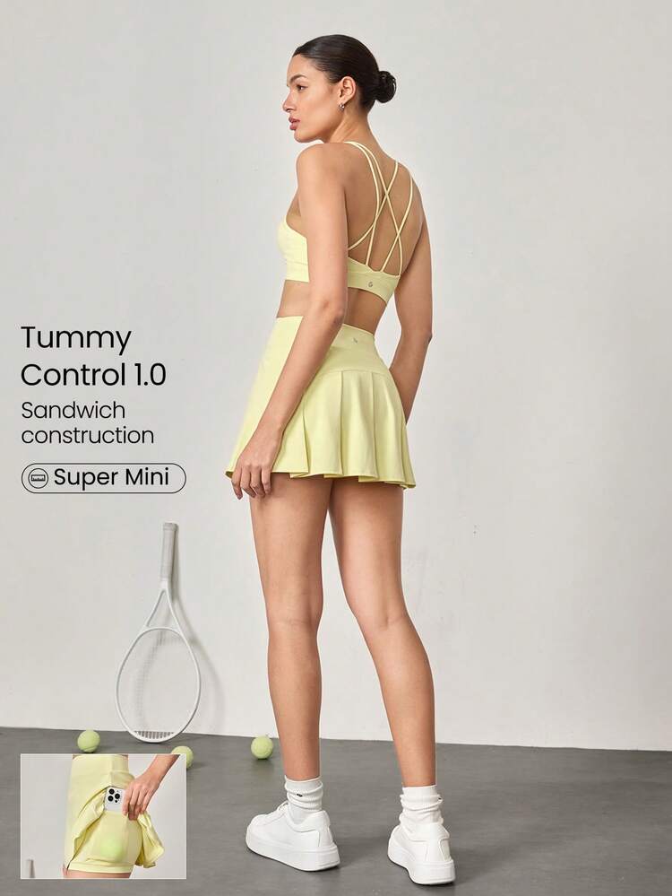 Falda de ejercicio con control de abdomen, cintura alta, forma de V y volantes, con pantalón corto incorporado, cómoda y elástica de 4.5" para tenis, golf y uso diario