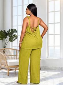 SOLERSUN 大码女装春夏时尚优雅性感休闲度假两件套，吊带背心长款上衣，不对称单肩设计，扭褶露背摆领，搭配长款阔腿裤，纯色草绿色针织面料，适合日常穿着、购物、约会、返校季、音乐节、海滩派对、圣帕特里克节、婚礼宾客等场合。 - 綠色 - 查看 3