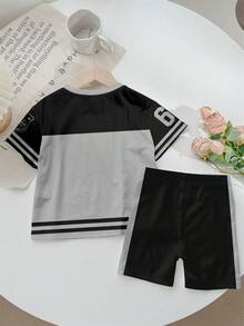 SHEIN Bộ 2 món quần short tay ngắn phong cách tối giản thường ngày dành cho bé gái, thích hợp cho mùa hè, kiểu dáng thể thao cổ điển, in hình số 6, 7, "Sáu", "Bảy" kinh điển. - Nhiều màu - Xem 4