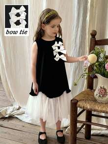 SHEIN Elladie kids 女童春夏新款简约优雅连衣裙，浅桃色3D蝴蝶结缎带，黑色梭织面料拼接浅桃色网纱不对称下摆无袖连衣裙，适合年轻女孩，简约优雅的女士风格，适合日常、上学、外出、度假等春夏穿着。儿童连衣裙，蓬蓬裙，女童连衣裙，黑白儿童连衣裙，蝴蝶结连衣裙，黑白女童连衣裙，幼儿女童夏季服装。柔软连衣裙。 - 黑色 - 查看 6