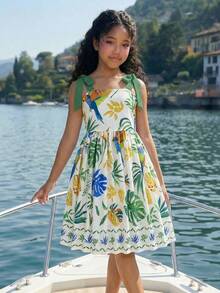 SHEIN Young Girl Tropical Print Spaghetti Strap Dress, Vacation Young Girls Dresses Kids Summer Dresses Kids Clothes Girls Tropical Print Sundress With Tie Shoulder Straps Kids Summer Beach Dress Toddler Girl Floral And Leaf Pattern Mini Dress With Bow Details Comfortable Summer Outfit For Play Tropical Print Kids Dress Casual Dress For Kids Beach Dress For Kids - White - View 10