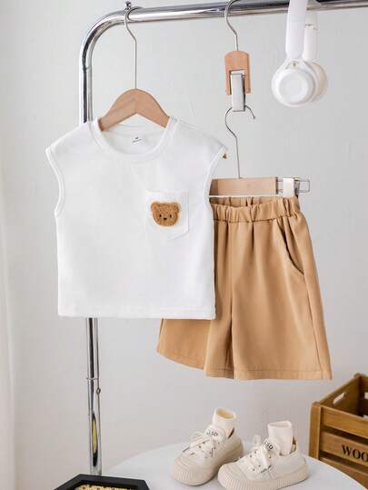 夏季新款时尚男童两件套，小熊图案圆领无袖T恤+休闲短裤，适合日常、休闲和运动穿着。