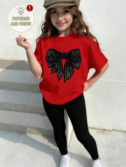 SHEIN Sparklyn Conjunto de camiseta casual y leggings con estampado gráfico, decoración de lazo negro brillante, minimalista y refrescante, para niña preadolescente en primavera y verano, uso diario cómodo