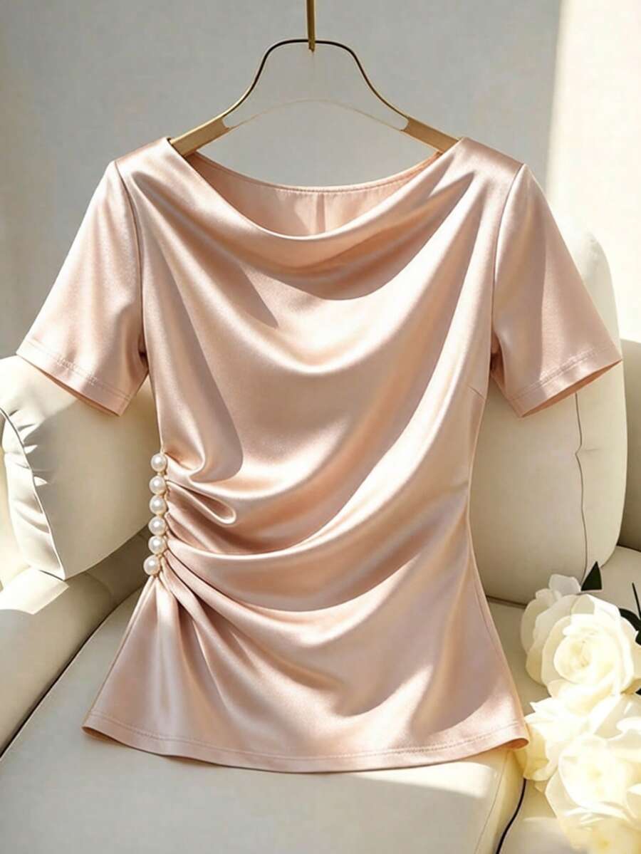 Franclia Bộ sưu tập mới dành cho nữ: Thanh lịch và gợi cảm, hoàn hảo cho công sở, kỳ nghỉ, bãi biển, đi làm, những dịp lãng mạn, tiệc tùng, sinh nhật, hòa nhạc, ngày Valentine và lễ hội. Áo nữ mùa hè mới màu sâm panh bằng satin, cổ bèo nhún, tay ngắn, đính ngọc trai với thiết kế độc đáo, tôn dáng eo và xếp ly thanh lịch. Thích hợp cho các buổi đi chơi, mùa hè, mặc thường ngày và nhiều dịp khác. Áo màu sâm panh, phong cách thanh lịch dành cho nữ, thích hợp cho việc đi làm. - Rượu sâm banh - Xem 1