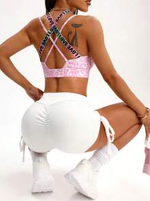 Sovereign Charm Women's Criss-Cross Back Letter Tape Leopard Print Sports Bra - Multicolor - View 3