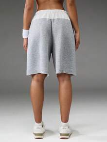 Normani Quần short nữ dáng rộng, thoải mái, có dây rút ở eo, phối màu tương phản. - Xám - Xem 7