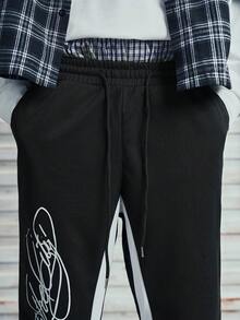 Modcrash Pantalones de chándal acampanados negros con decoración de franja blanca lateral para hombres, cintura elástica con cordón, adecuados para uso casual y streetwear, estilo retro americano, unisex, ajuste relajado para atuendos de verano - adecuados para uso diario y atuendos de vacaciones de verano. - Multicolor - Ver 4