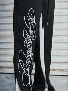 Modcrash Pantalones de chándal acampanados negros con decoración de franja blanca lateral para hombres, cintura elástica con cordón, adecuados para uso casual y streetwear, estilo retro americano, unisex, ajuste relajado para atuendos de verano - adecuados para uso diario y atuendos de vacaciones de verano. - Multicolor - Ver 5