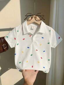 SHEIN Camisa polo de manga corta y patrón de corona para jóvenes estilo universitario, cómoda, transpirable, versátil, adecuada para jugar afuera e ir a la escuela, ideal para la primavera y el verano - Blanco - Ver 5