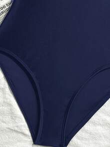 Emery Rose Kids Emery Rose Kids Bộ đồ bơi liền thân phối màu đen trắng tương phản dành cho bé gái tuổi teen, kiểu dáng tối giản cho kỳ nghỉ biển. - Màu xanh hải quân - Xem 7